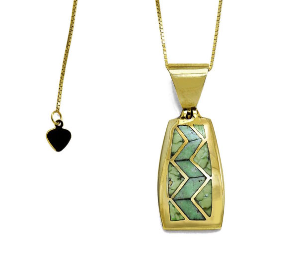 Heavy gold pendant with inlay