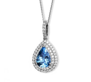 Teardrop shaped pendant with aquamarine stone in center