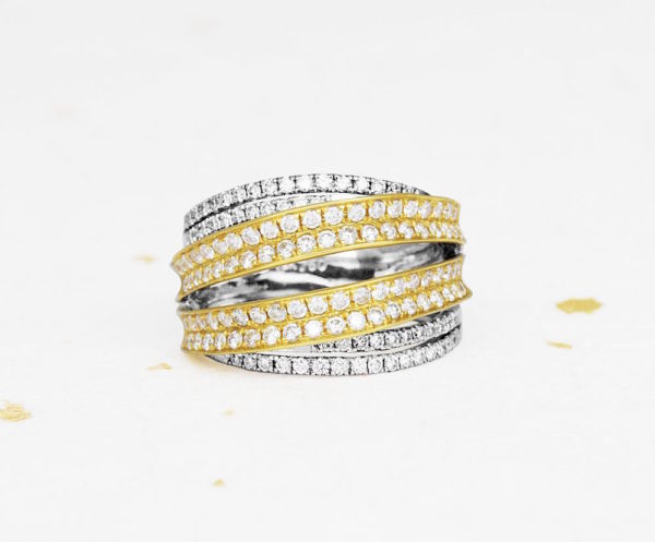 Womens diamond ring in white and yellow gold.