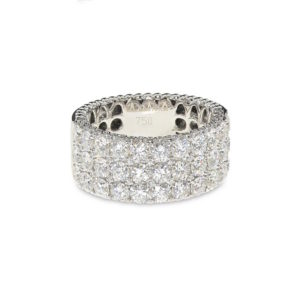 A wide white gold band covered with round diamonds