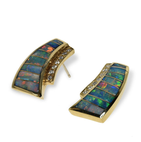 Gold earrings featuring diamonds and opal